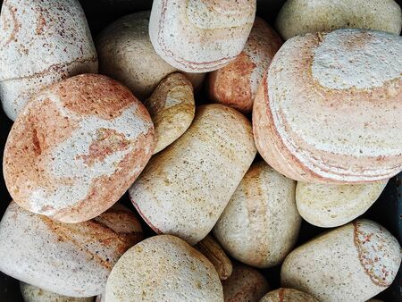 Heap of colored  stones used to decorate the garden or parts of the houseの写真素材