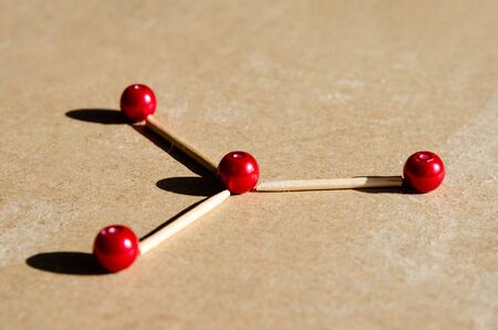 Close-up of  red  plastic  balls  which represents concept of social network  connection .の写真素材