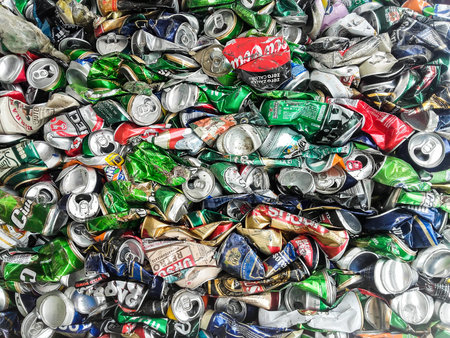 Close-up  of  pressed aluminum beer cans ready for recycling .