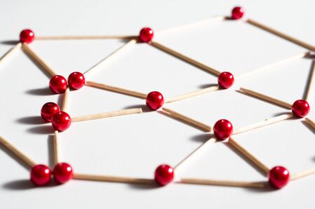 Balls and sticks representing the concept of social distancing  or  closeness  group of people . Organizing groups of people in public after leaving the quarantine of covid-19.の写真素材