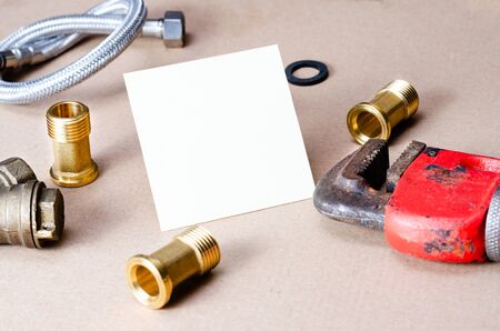 Close-up  view  of  accessories for repairing plumbing .Concept regarding the business card of the craftsman .の写真素材