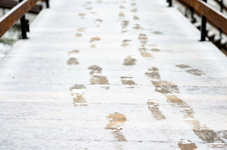 Close-up  traces of boots in the snowの写真素材