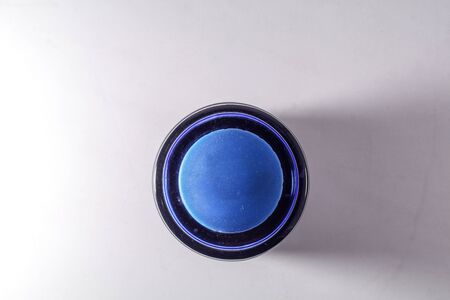 top view of a blue ink bottle against white backgroundの写真素材