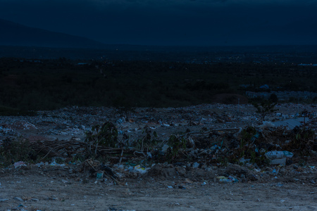 Dusk at the final dump site TPA Kawatuna, Palu city, Indonesia Central Sulawesi. long exposureの写真素材