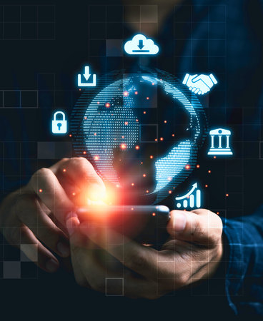 A person's hands cradle a glowing digital globe surrounded by interconnected technology icons representing data, security, and cloud computing.の写真素材