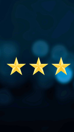 Three bright yellow stars are centered horizontally against a dark, out-of-focus background with...