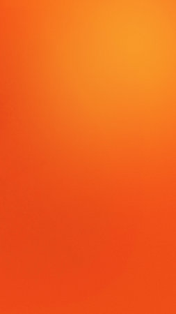 A warm, abstract gradient transitioning from deep orange to bright yellow, with a visible pixelated texture creating a digital art feel.の写真素材