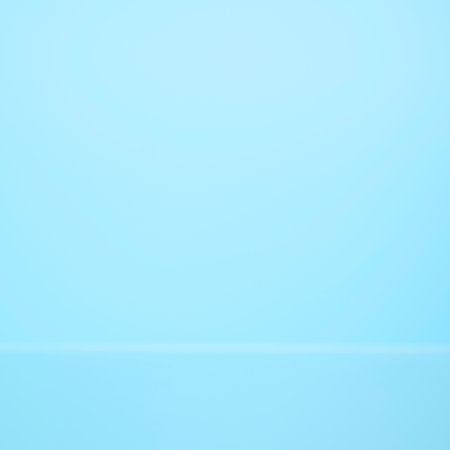 A clean, minimalist background featuring a smooth gradient from light to slightly darker blue, with a faint horizontal line.の写真素材