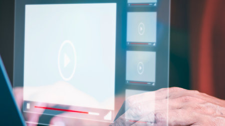 A person's hand interacts with a glowing holographic screen showing a digital security shield and progress bar.の写真素材
