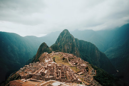 An aerial view of Machu Picchu, a famous ancient Inca city in the mountains.