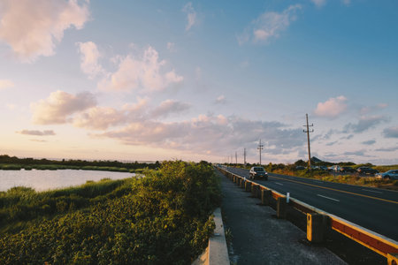 A peaceful scene with a colorful sunset horizon.