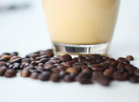 Coffee Bean and Cup of Cappucino