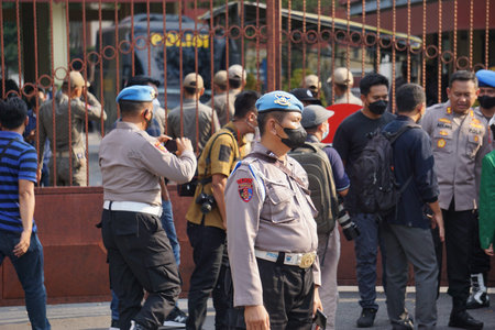 Kediri, East Java, Indonesia - April 12th, 2022 : Indonesian police ready to secure demonstrationsのeditorial素材