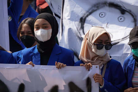 Kediri, East Java, Indonesia - April 18th, 2022 : Indonesian students demonstrate about rising...