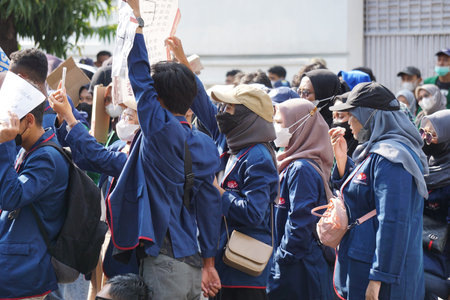 Kediri, East Java, Indonesia - April 18th, 2022 : Indonesian students demonstrate about rising...