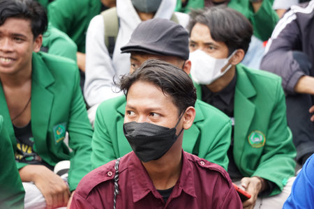 Kediri, East Java, Indonesia - April 18th, 2022 : Indonesian students demonstrate about rising...