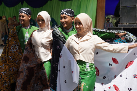 The beautiful Indonesian woman with traditional cloth which is called batikのeditorial素材