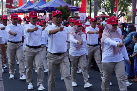 Indonesian participating in marching (baris berbaris) to celebrate Indonesian independence dayのeditorial素材