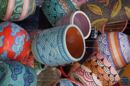 Colorful clay pots for sale at a market stall in Istanbul, Turkey