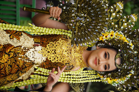 Beautiful participant Biro Fashion Carnival with an exotic costume.