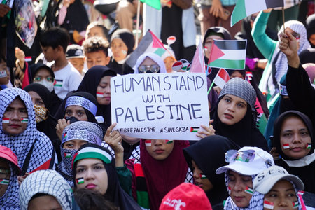 People support Palestine "Stop Genocidal War Crimes Cease Fire"のeditorial素材