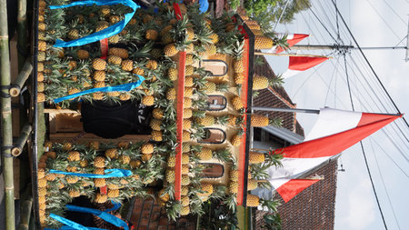 Pineapple tree (Ananas comosus) with a natural background. Exotic tropical fruit. Indonesian call it...