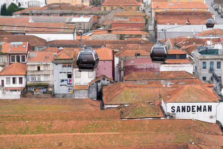PORTO, PORTUGAL - FEBRUARY 08: Cable cars near the Dom LuÃÂ­s I Bridge, Porto, Portugal on February 08, 2016のeditorial素材