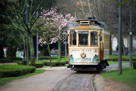 PORTO, PORTUGAL - FEBRUARY, 11: A tram in a park on February 11, 2016 in Porto, Portugalのeditorial素材