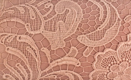relief pastel fabric texture with macramÃ© style lace 