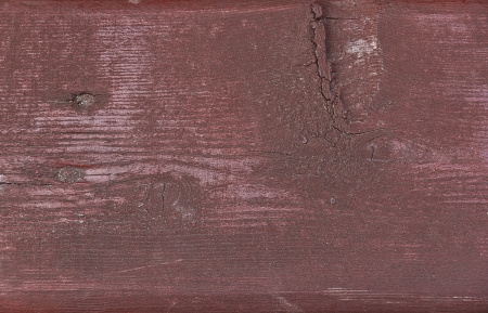 Close view of wooden texture of bordeaux color with cracksの写真素材
