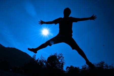 man silhouette / superb freedom jumpの写真素材
