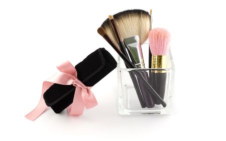 MAKEUP BRUSH SET WITH CASE AND PINK BOWの写真素材