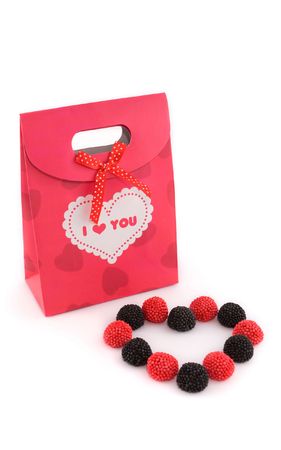 Red bag for gifts with candyの写真素材