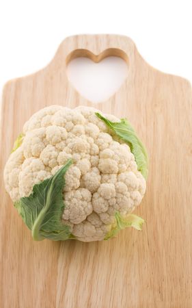 Cauliflower  on cutting boardの写真素材