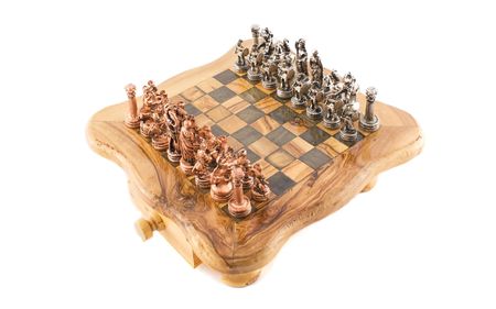 Metal Chess on olive wood chessboard の写真素材