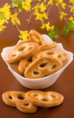 Delicious cookies on a white plate with flowerの写真素材