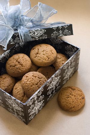cookies in a box with a bowの写真素材