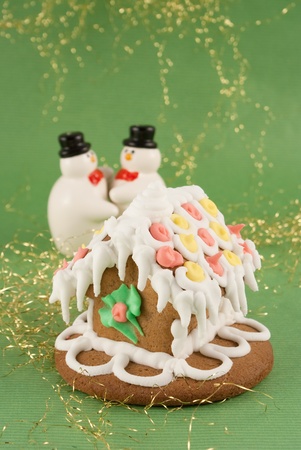  traditional christmas gingerbread house with snowmansの写真素材