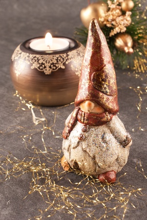 christmas gnome with tree and candleの写真素材