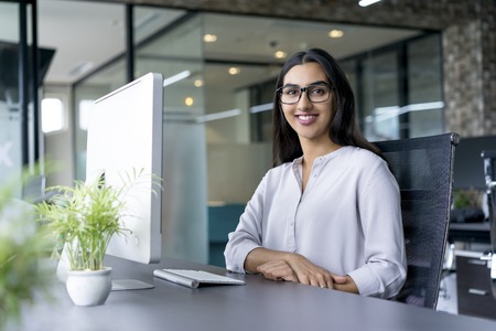 Portrait of successful businesswoman in officeの写真素材