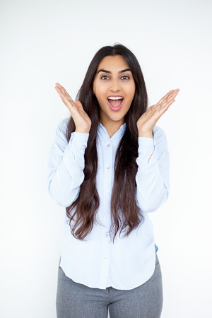 Surprised Beautiful Indian Woman Spreading Handsの写真素材