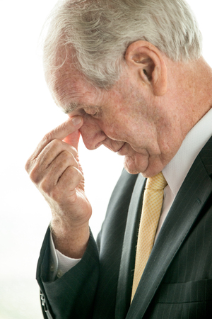 Profile of Senior Business Man Thinking Deepの写真素材