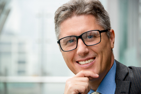 Closeup of Smiling Middle-aged Business Manの写真素材