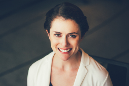 Closeup of Smiling Beautiful Adult Businesswomanの写真素材