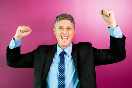 Cheerful Business Leader Celebrating Successの写真素材