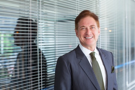 Closeup of Smiling Middle-aged Business Man