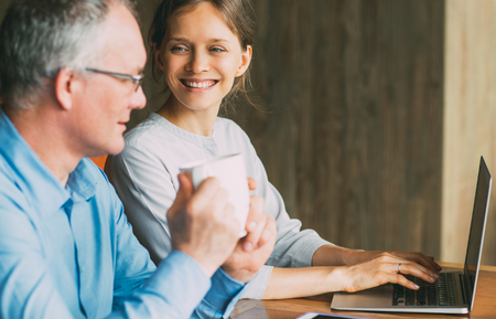 Business Team of Two People Working in Cafeの写真素材