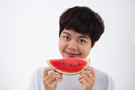 Content Young Asian Woman Holding Watermelonの写真素材