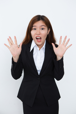 Amazed young lady surprised with last newsの写真素材