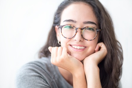 Smiling face of teenage girl wearing eyeglassesの写真素材